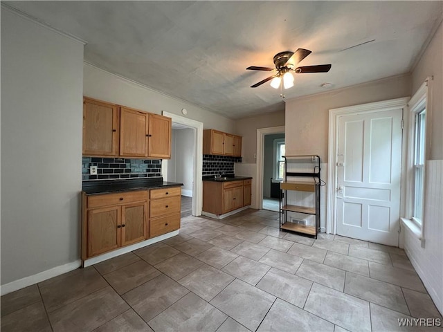 288 Abbott Rd, Buffalo, NY 14220 - kitchen with decorative backsplash, dark countertops, and a ceiling fan