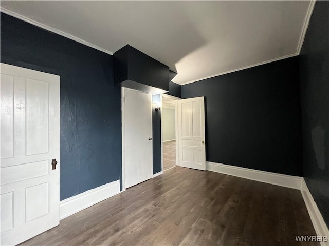 288 Abbott Rd, Buffalo, NY 14220 - unfurnished bedroom featuring wood finished floors and crown molding