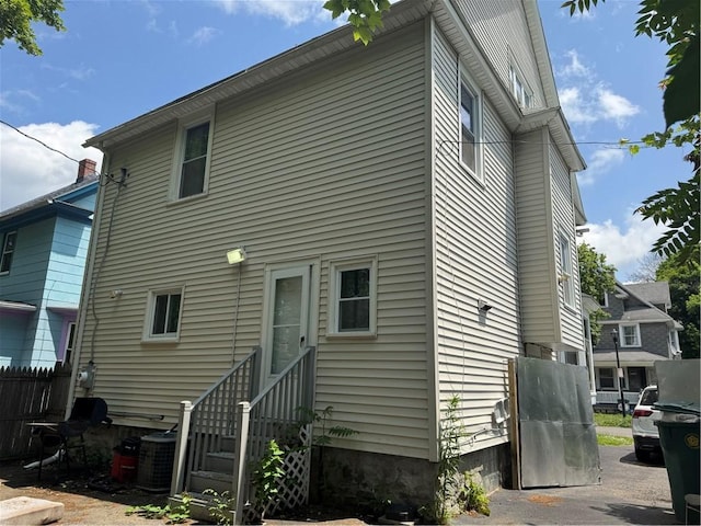 19 Sidney St, Rochester, NY 14609 - rear view of property with entry steps