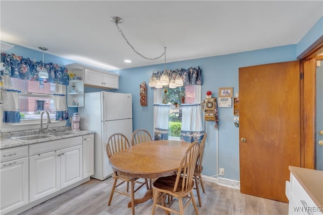 2482 Grand Ave, Niagara Falls, NY 14301 - dining space featuring light wood-style floors and recessed lighting