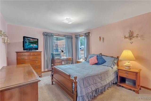 2482 Grand Ave, Niagara Falls, NY 14301 - bedroom with light carpet and baseboards