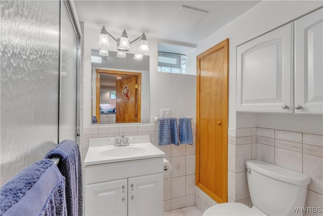 2482 Grand Ave, Niagara Falls, NY 14301 - bathroom with tile walls and vanity