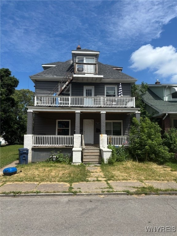 545 Tronolone Pl, Niagara Falls, NY 14301 - traditional style home featuring covered porch and a balcony