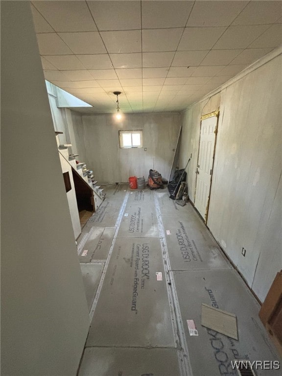 545 Tronolone Pl, Niagara Falls, NY 14301 - basement featuring stairs and a drop ceiling
