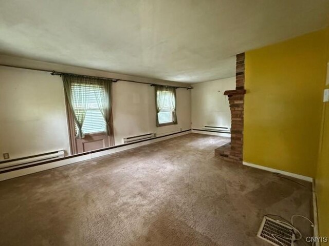 1046 Ammon Rd, Lewis, NY 13489 - carpeted spare room featuring baseboards