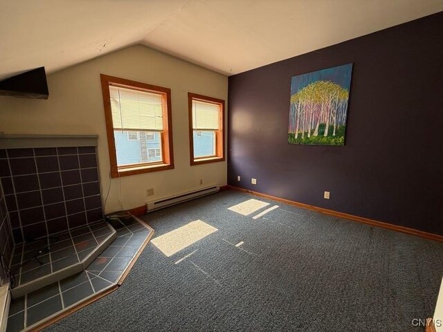1046 Ammon Rd, Lewis, NY 13489 - additional living space featuring a baseboard radiator, vaulted ceiling, and carpet