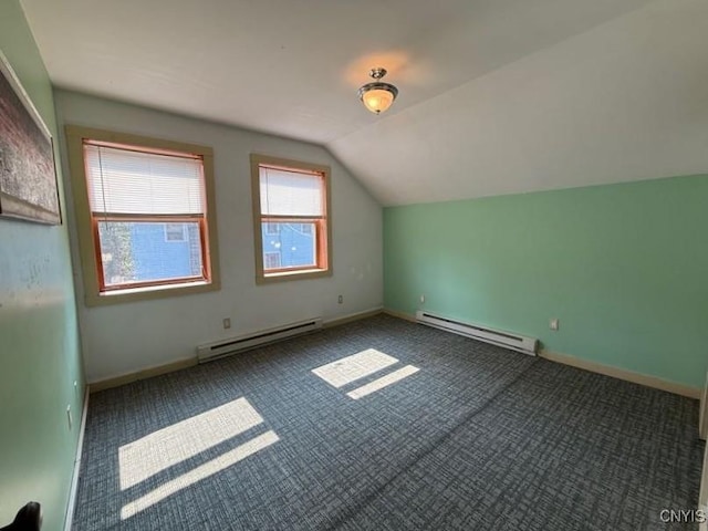 1046 Ammon Rd, Lewis, NY 13489 - additional living space featuring a baseboard heating unit, carpet, and vaulted ceiling