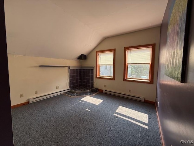 1046 Ammon Rd, Lewis, NY 13489 - bonus room with a baseboard heating unit, lofted ceiling, and carpet flooring