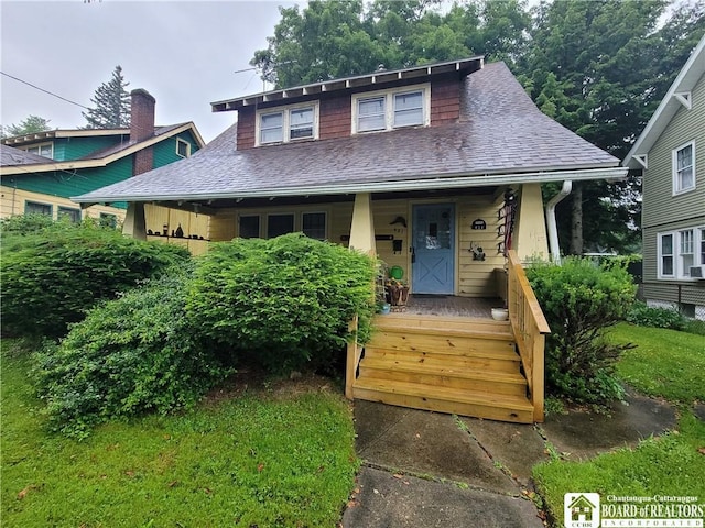 421 Falconer St, Jamestown, NY 14701 - view of front facade featuring covered porch and roof with shingles
