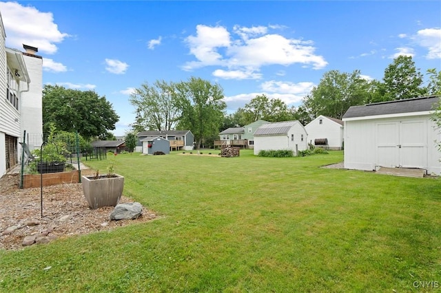 103 Walrath Dr, Sullivan, NY 13037 - view of grassy yard featuring a storage shed and a garden