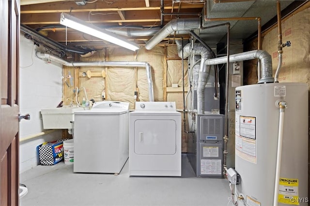 103 Walrath Dr, Sullivan, NY 13037 - washroom featuring gas water heater and washer and clothes dryer