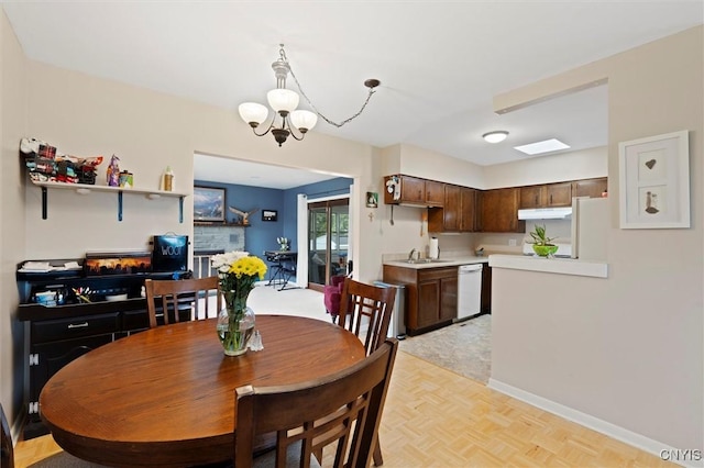 103 Walrath Dr, Sullivan, NY 13037 - dining area with a chandelier and baseboards