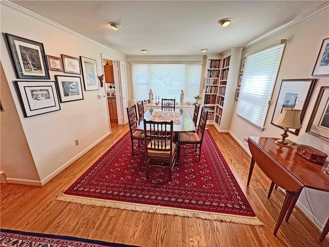 10 Danbury Cir N, Brighton, NY 14618 - dining room featuring wood finished floors and ornamental molding