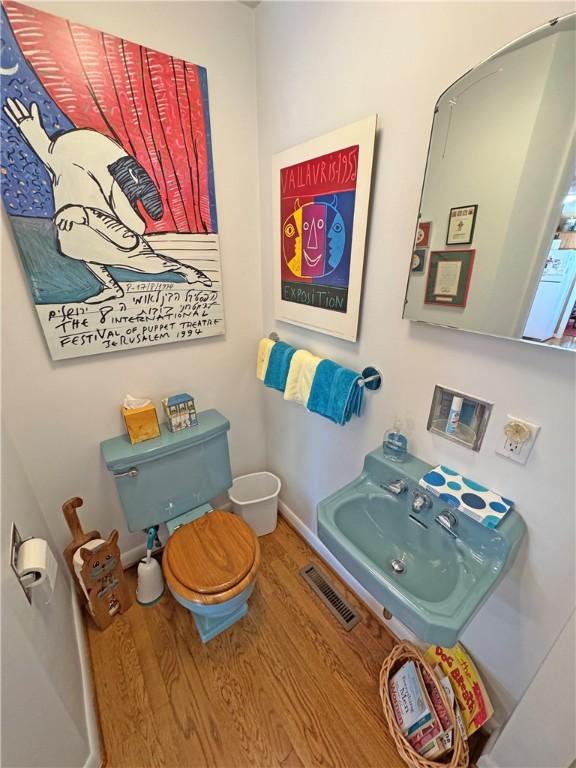 10 Danbury Cir N, Brighton, NY 14618 - bathroom with wood finished floors and baseboards