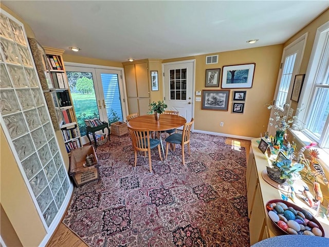 10 Danbury Cir N, Brighton, NY 14618 - dining room with healthy amount of natural light, french doors, and recessed lighting