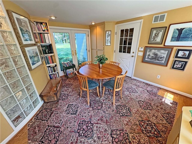 10 Danbury Cir N, Brighton, NY 14618 - dining space featuring baseboards and french doors
