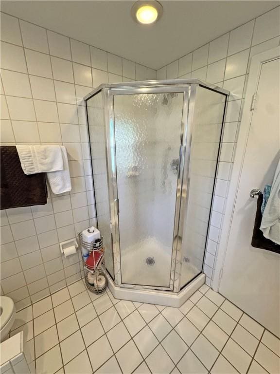 10 Danbury Cir N, Brighton, NY 14618 - bathroom with tile patterned floors and a stall shower