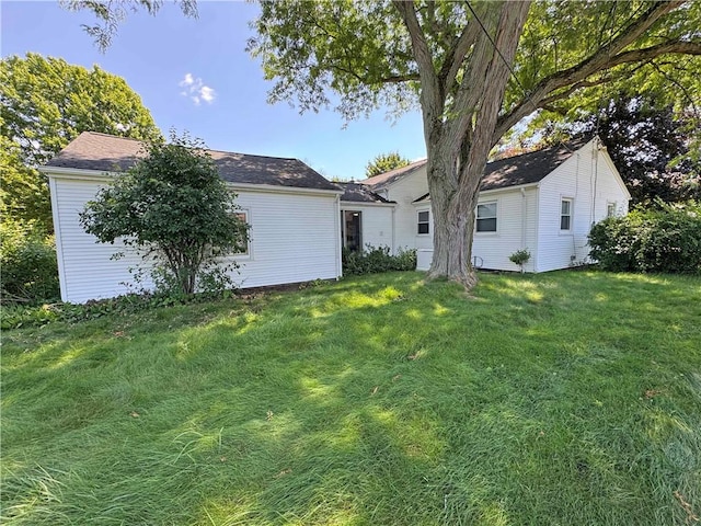10 Danbury Cir N, Brighton, NY 14618 - rear view of property featuring a yard