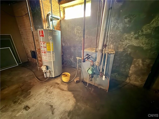 633 Pleasant St, Utica, NY 13501 - utility room featuring water heater