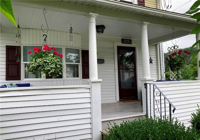 74 Cleveland Ave, Elmira, NY 14905 - property entrance with covered porch