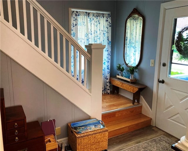 74 Cleveland Ave, Elmira, NY 14905 - foyer entrance featuring wood finished floors and stairs
