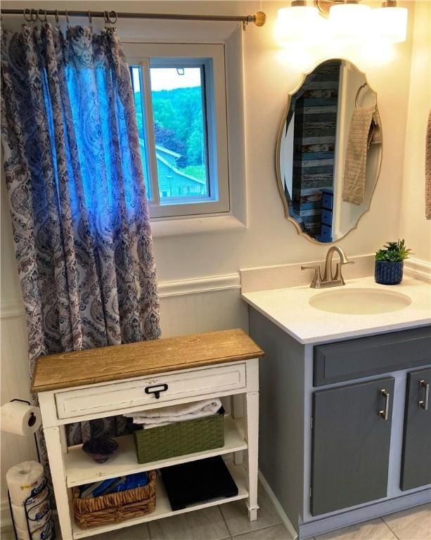 74 Cleveland Ave, Elmira, NY 14905 - bathroom with vanity and tile patterned flooring