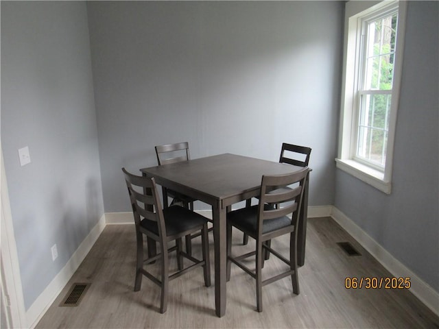 4 Geneva St, Lyons, NY 14489 - dining area with light wood finished floors and baseboards
