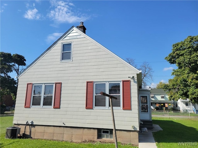 465 18th St, Niagara Falls, NY 14303 - view of home's exterior with entry steps and a chimney