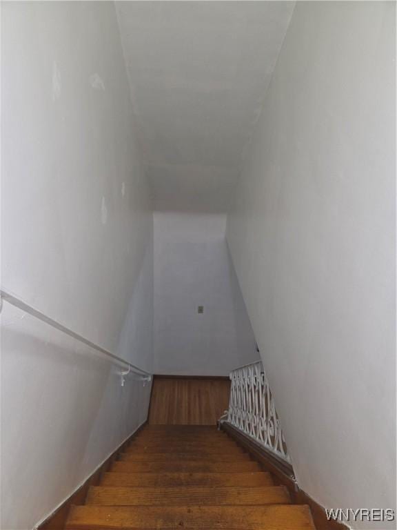 465 18th St, Niagara Falls, NY 14303 - stairs featuring wood finished floors