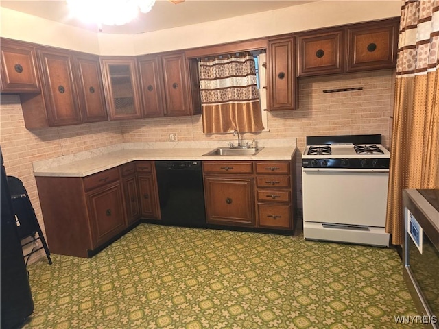 465 18th St, Niagara Falls, NY 14303 - kitchen with dishwasher, white gas stove, light countertops, and tasteful backsplash