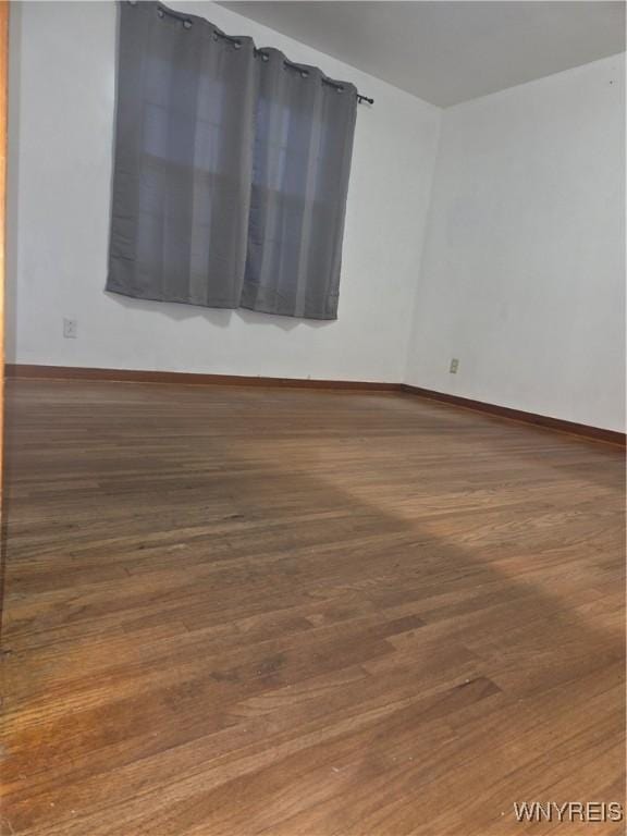 465 18th St, Niagara Falls, NY 14303 - unfurnished room featuring wood finished floors and baseboards