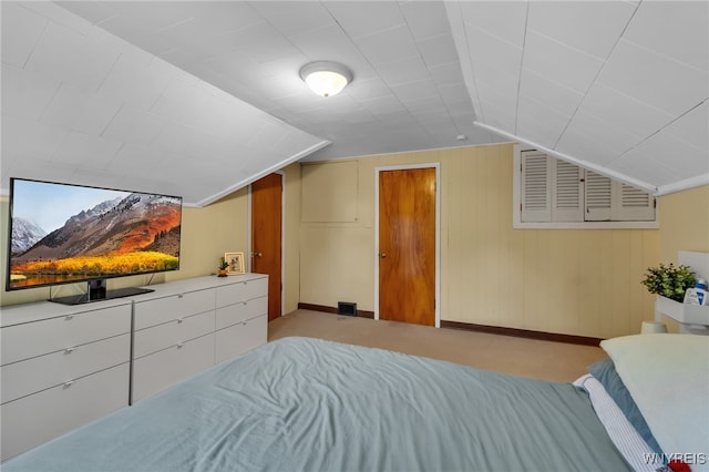 61 Chateau E, Amherst, NY 14226 - bedroom featuring vaulted ceiling and wood walls