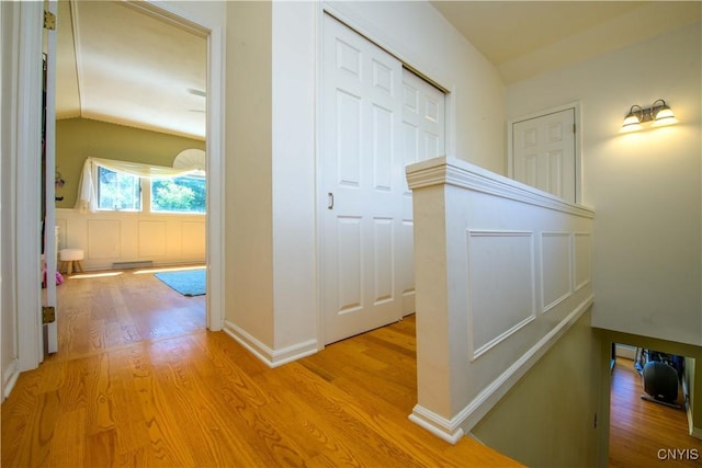 3200 Ransom Rd, Pompey, NY 13078 - corridor with light wood finished floors and lofted ceiling