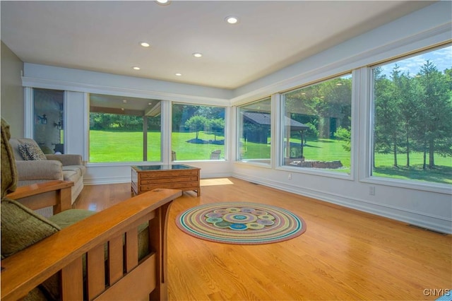 3200 Ransom Rd, Pompey, NY 13078 - sunroom / solarium with wood finished floors, plenty of natural light, and recessed lighting