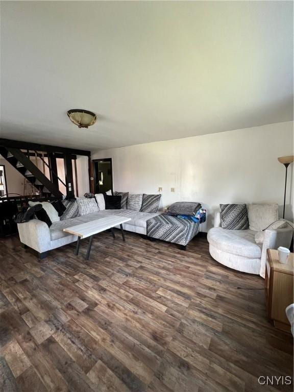 11 Canal St, Mentz, NY 13140 - living room featuring wood finished floors and stairs