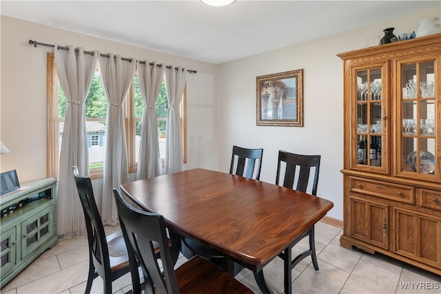 4024 Bond St, Hamburg, NY 14219 - dining area featuring light tile patterned flooring