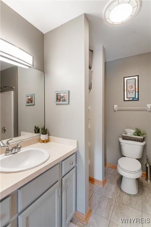 4024 Bond St, Hamburg, NY 14219 - full bathroom with vanity and tile patterned flooring