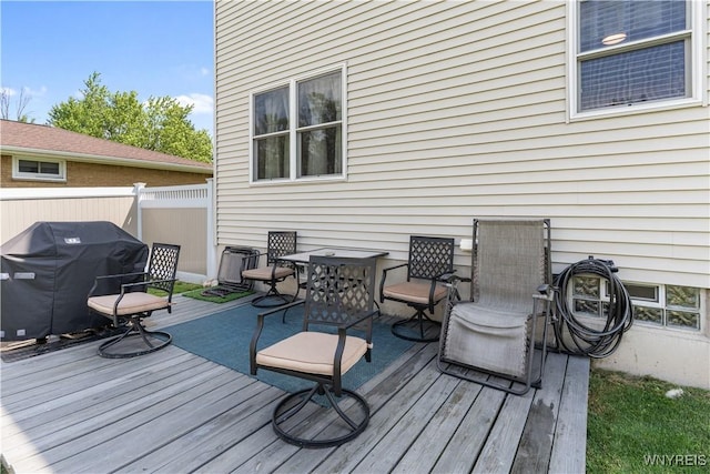 4024 Bond St, Hamburg, NY 14219 - wooden deck with grilling area and outdoor dining area