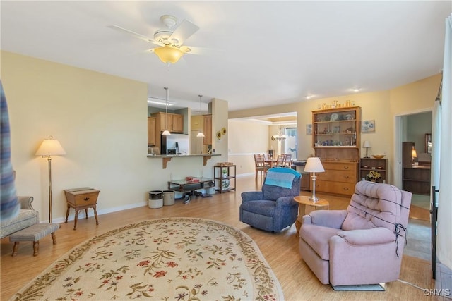 12 Village View Dr, Tully, NY 13159 - living area with light wood-style flooring and a ceiling fan