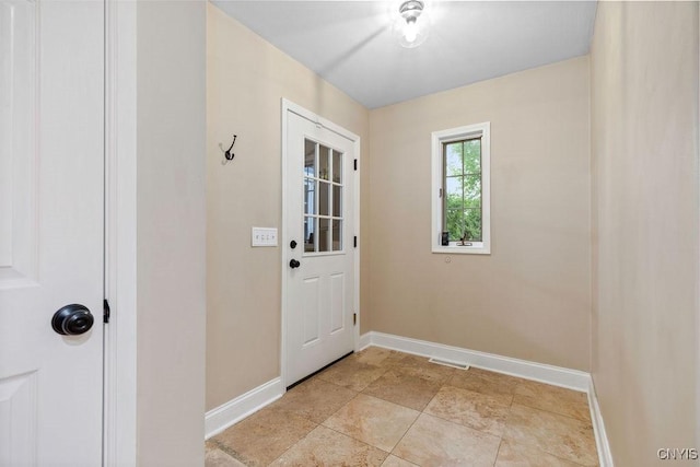 3306 Glen Abbey, Lysander, NY 13135 - entryway featuring baseboards and light stone finish flooring