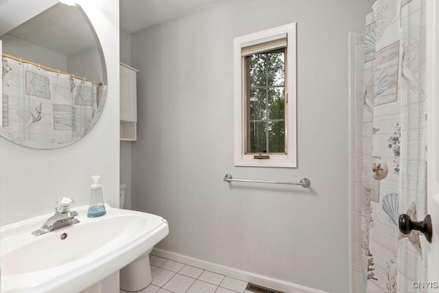 3306 Glen Abbey, Lysander, NY 13135 - bathroom featuring a sink and a shower with curtain