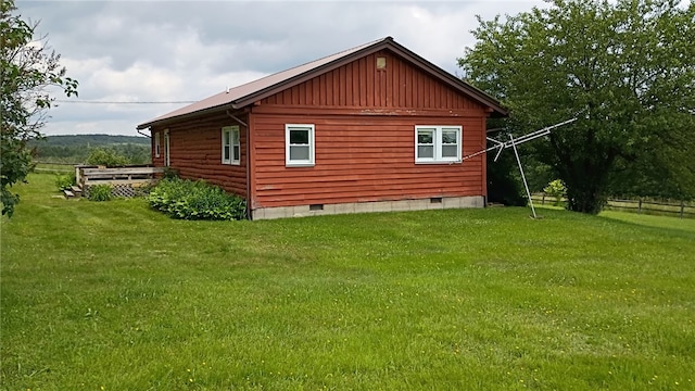 372 Windsong Rd, Harpersfield, NY 13786 - view of home's exterior with crawl space, a yard, and board and batten siding