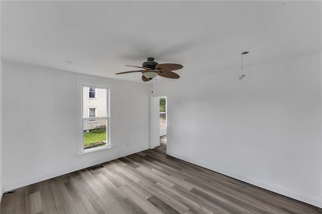 503 Main St, Oneonta, NY 13820 - empty room with wood finished floors and ceiling fan