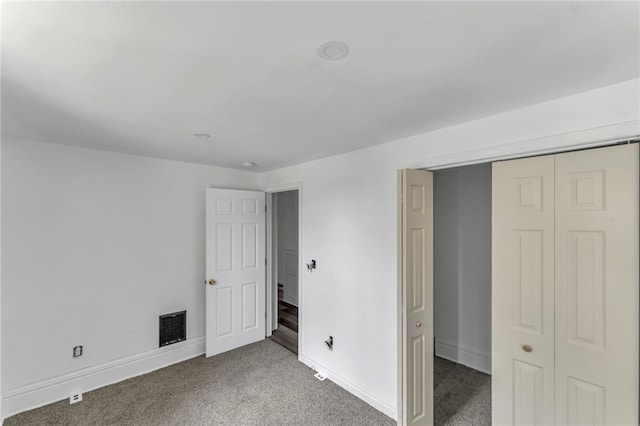 503 Main St, Oneonta, NY 13820 - unfurnished bedroom with carpet floors and a closet