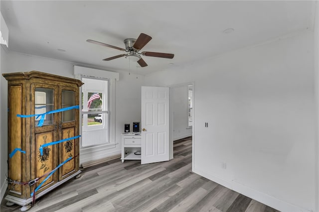 503 Main St, Oneonta, NY 13820 - unfurnished room featuring wood finished floors, a ceiling fan, and crown molding