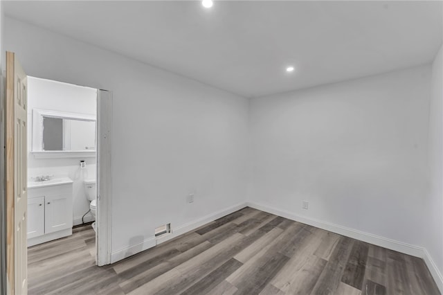 503 Main St, Oneonta, NY 13820 - unfurnished bedroom with wood finished floors and recessed lighting