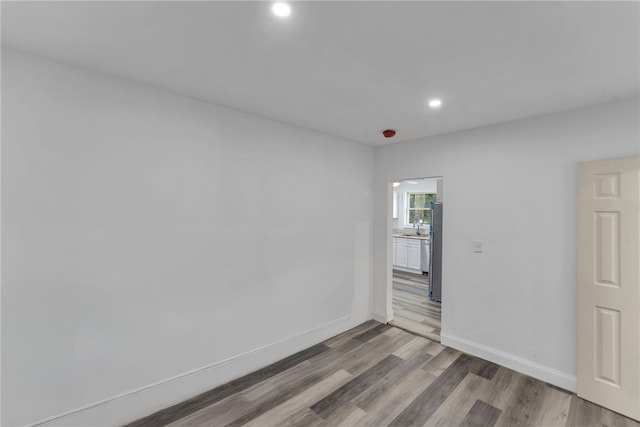 503 Main St, Oneonta, NY 13820 - unfurnished room with recessed lighting and wood finished floors