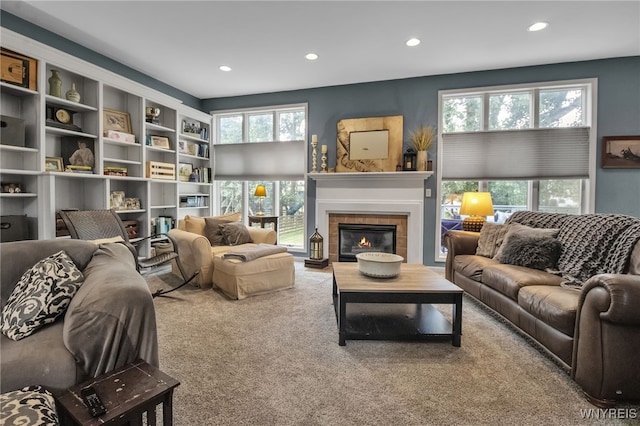 152 Pino Verde Ln, Amherst, NY 14221 - living room featuring recessed lighting, carpet, and a tiled fireplace