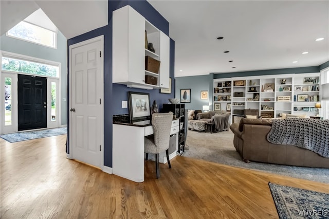 152 Pino Verde Ln, Amherst, NY 14221 - kitchen with open shelves, white cabinetry, light wood-style flooring, dark countertops, and recessed lighting