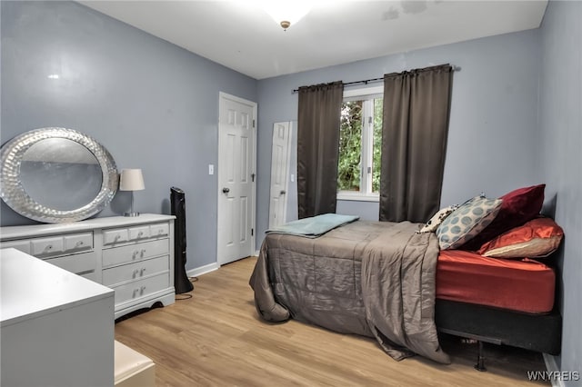 152 Pino Verde Ln, Amherst, NY 14221 - bedroom with light wood-style floors and baseboards